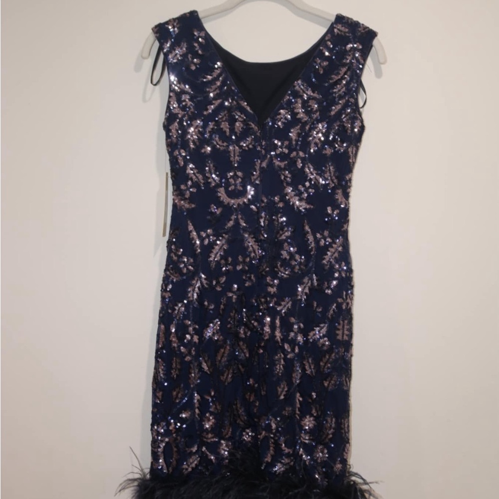 Eliza J petit feather